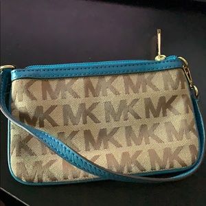 Michael Kors wristlet with Teal trim